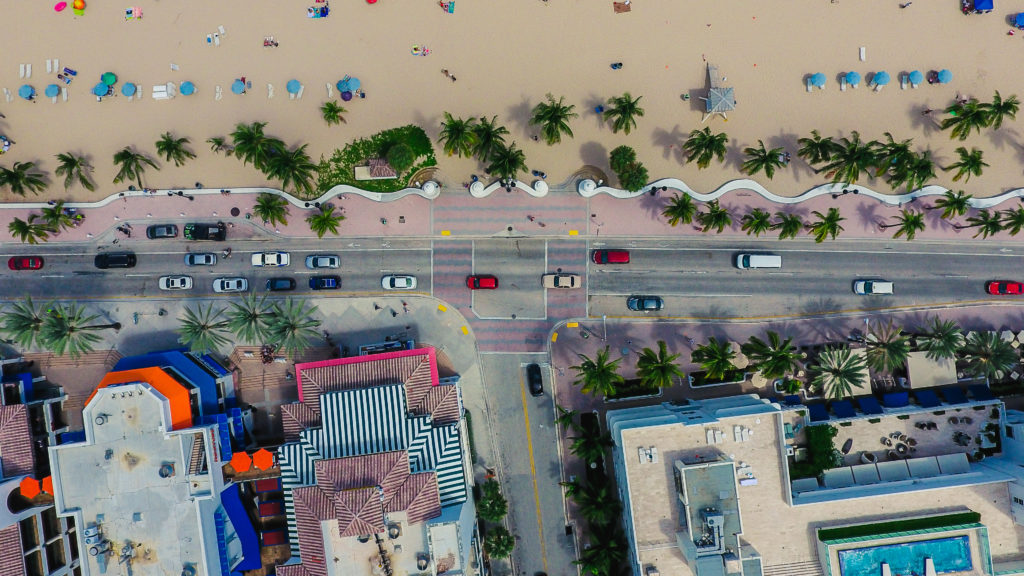 palm trees and beach near a Florida street